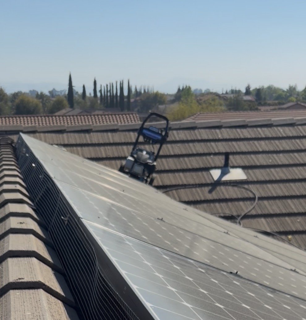 Bird-proofing mesh netting installed along the edge of a solar panel array